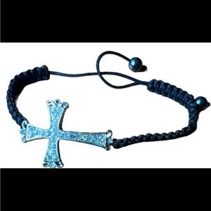 Silver crystal floating cross on black shamballa bracelet